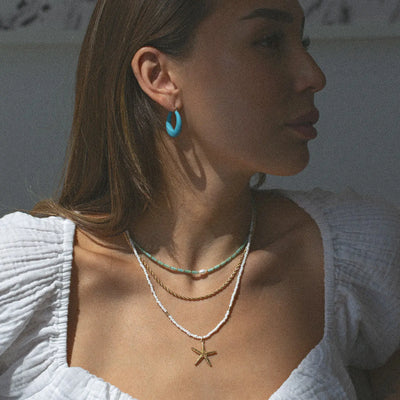 Ellie - Zeester witte kralen ketting