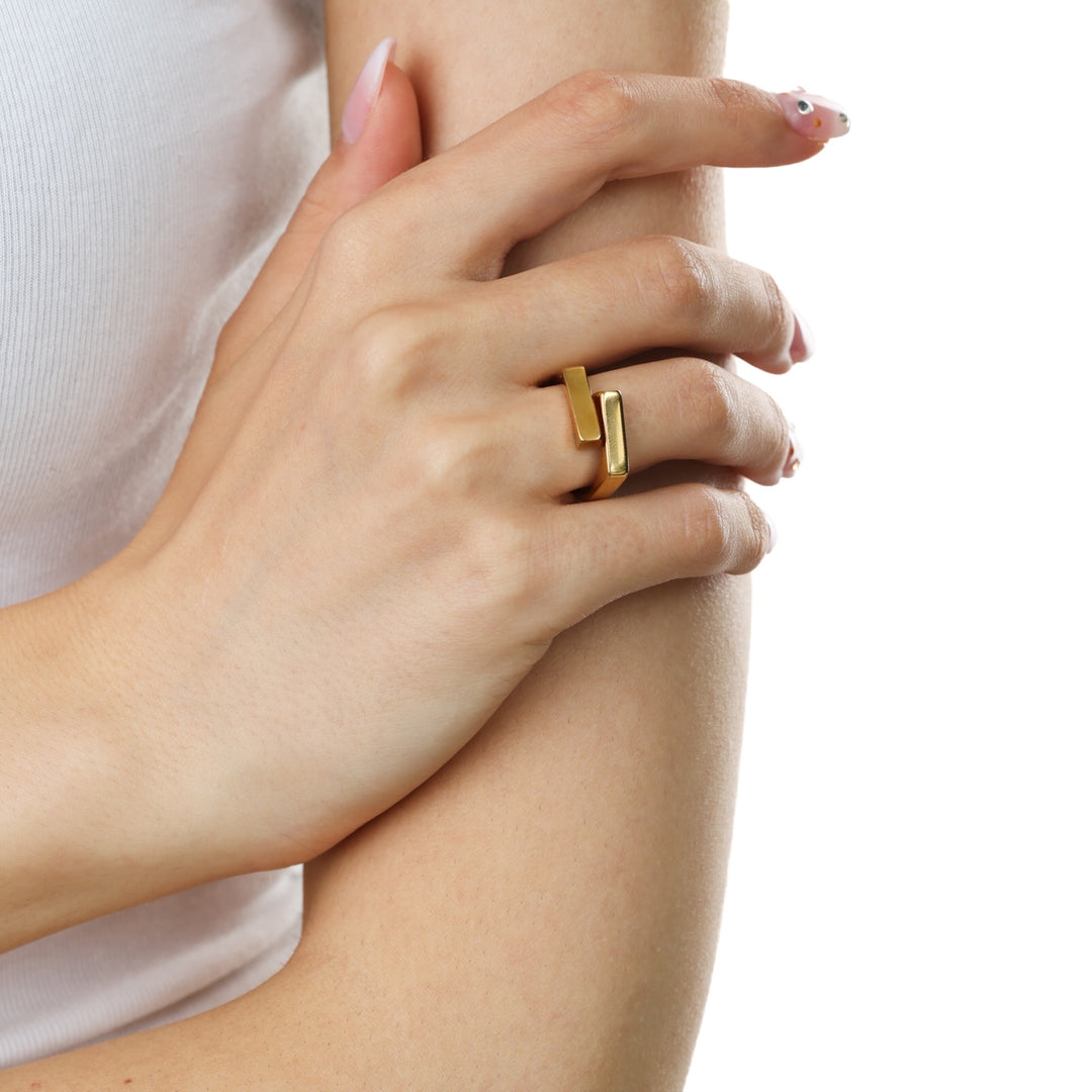 Brita – architectural ring in stainless steel, gold | Timi of Sweden