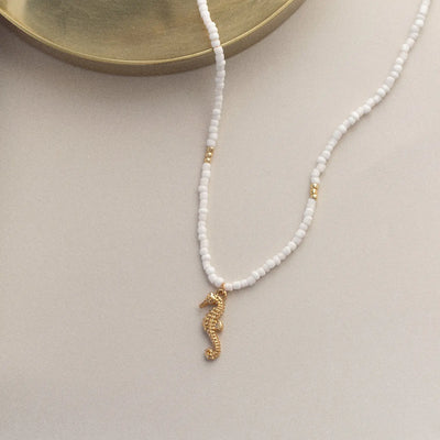 Ellie - Seahorse witte kralen ketting