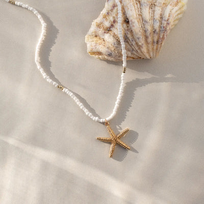 Ellie - Zeester witte kralen ketting