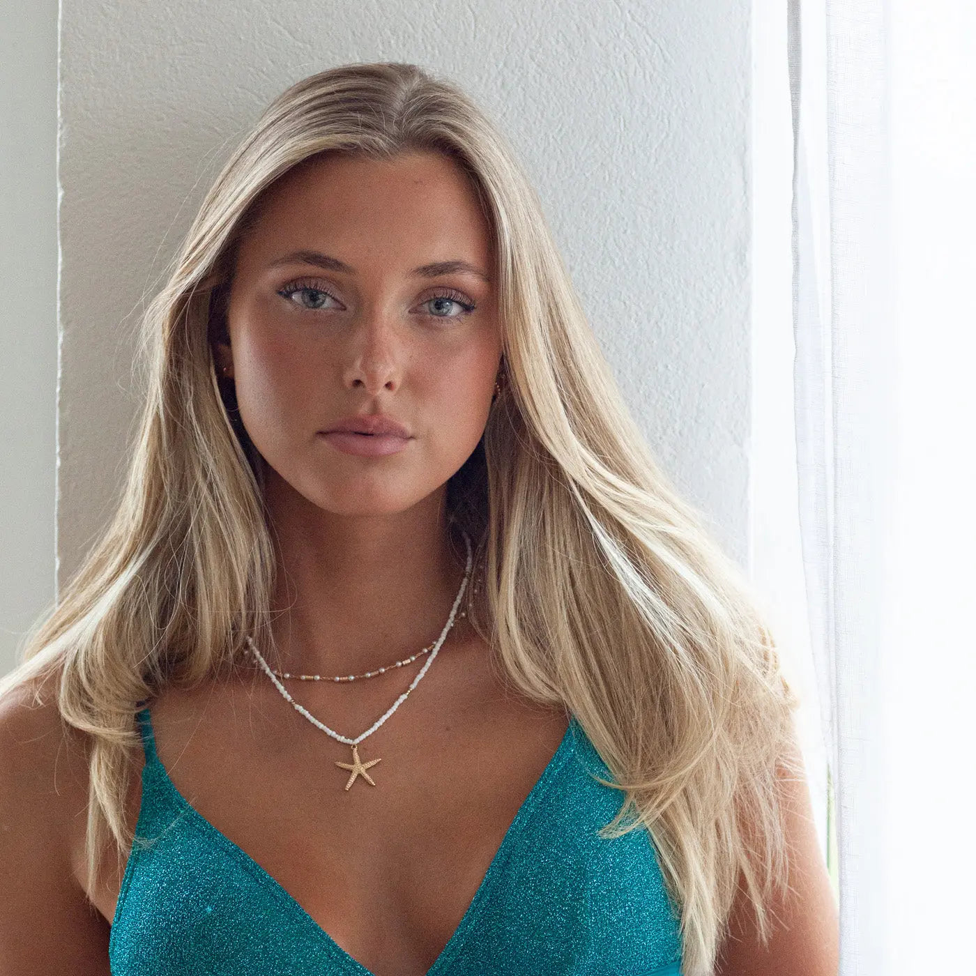 Ellie - Zeester witte kralen ketting