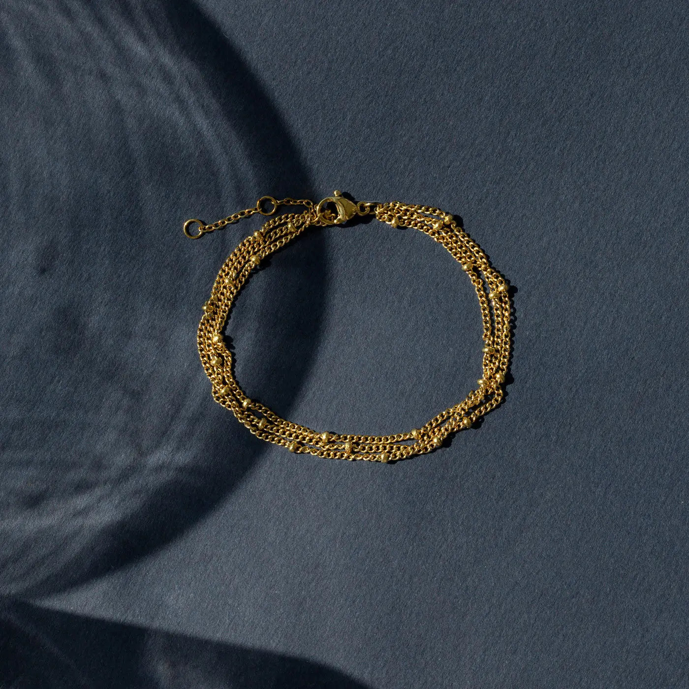 Mika - Drievoudige schakelarmband van roestvrij staal