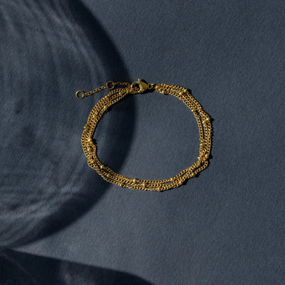 Mika - Drievoudige schakelarmband van roestvrij staal